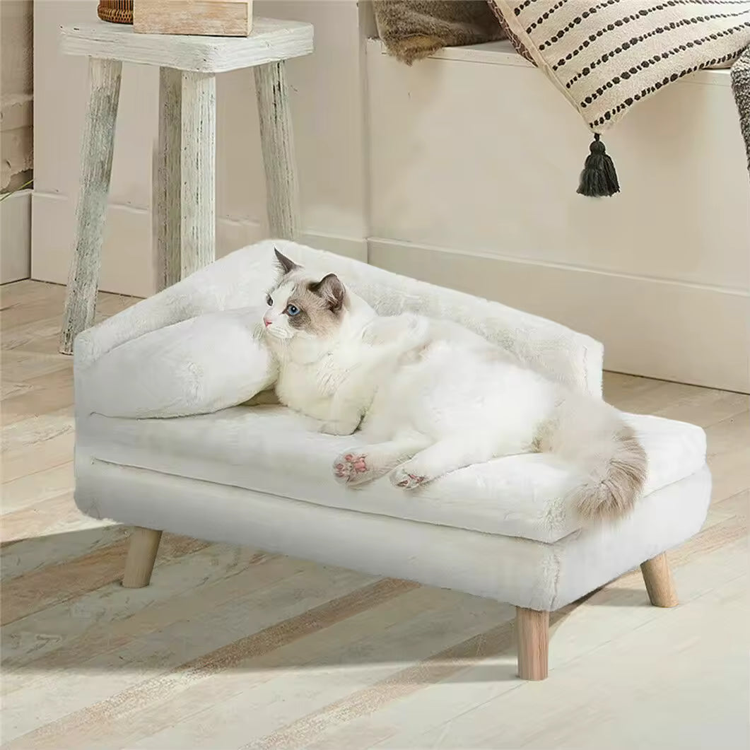 A stylish elevated grey pet bed with wooden legs